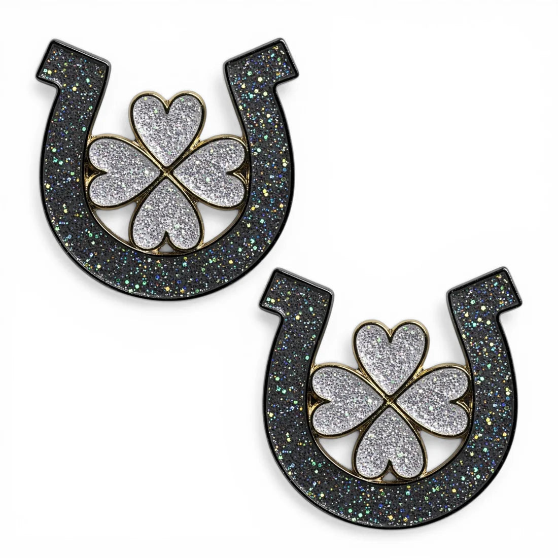 Front view of a pair of Horseshoe Clover Dubois Cheval Number Pin Charm on a white background