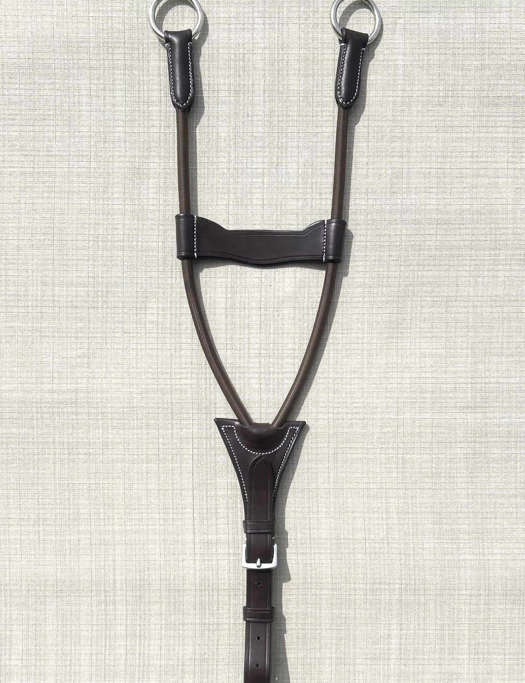 Full view of the Black Oak Running Fork Attachment with Elastic on a parchment style background