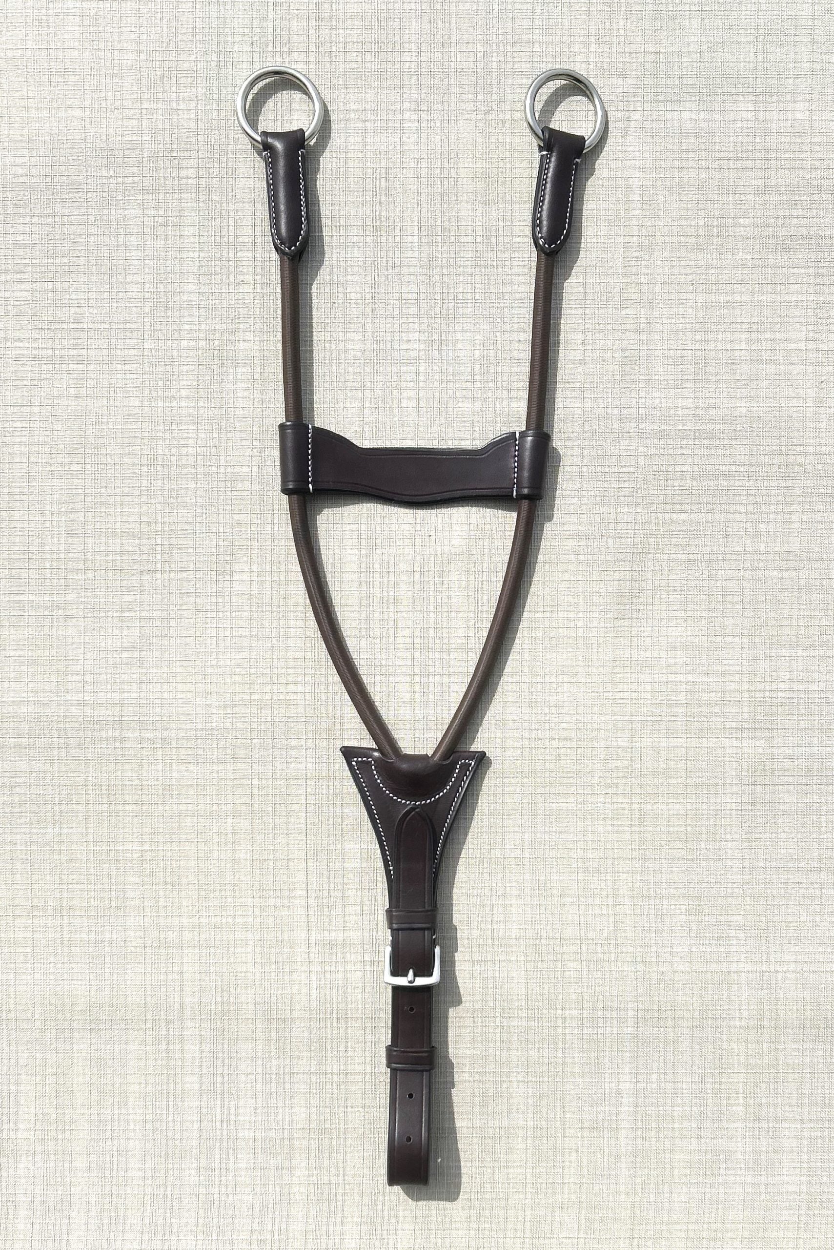 Full view of the Black Oak Running Fork Attachment with Elastic on a parchment style background