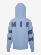 Back view of LeMieux Young Rider Sia Hoodie in powder blue with hood up and oversized LeMieux lettering on sleeves and back