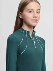 Model wearing LeMieux Young Rider Airflow Base Layer in Jungle showing quarter zip and perforated side panel