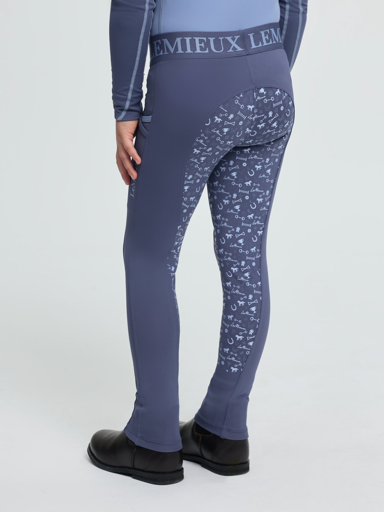 Back view of LeMieux Mini Pull On Breech in Shadow with elastic logo waistband and silicone grip print on seat and legs