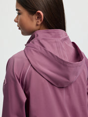 Close-up back view of LeMieux Young Rider Paige Quarter Zip Waterproof Jacket in Mallow showing hood and shoulder seams