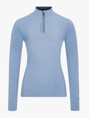 Front view of Powder Blue LeMieux Young Rider Classique Base Layer on a plain background
