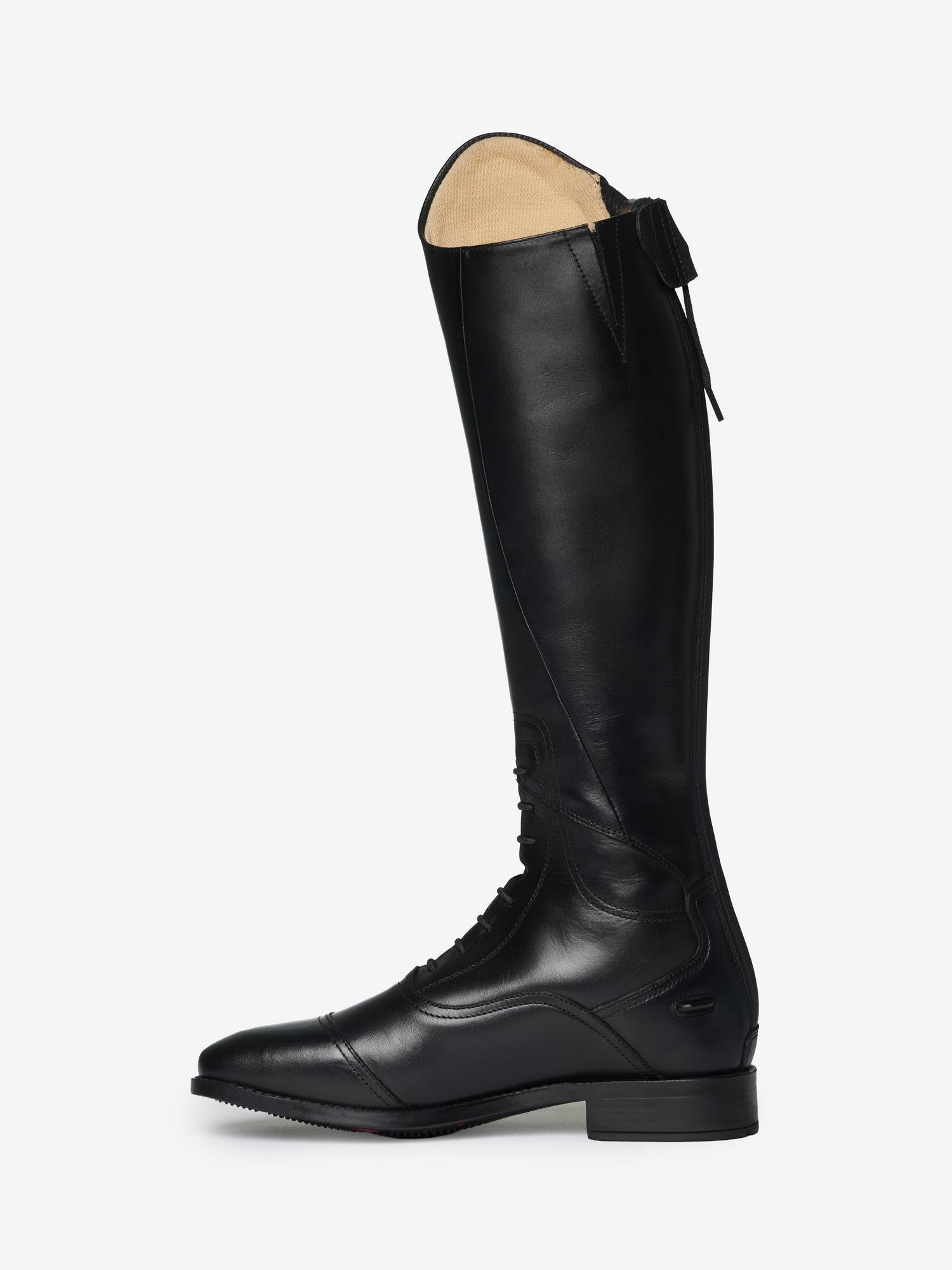 Side view of the LeMieux Junior Interchangeable Riding Boots in Black  showing stitching details