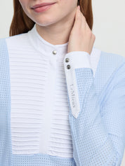 Close-up of LeMieux Arielle Long Sleeve Show Shirt in Mist showing white stand collar, pleated bib front, and button cuff with LeMieux tab