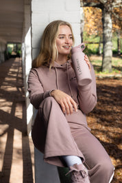Front view of a model wearing Wild Rose LeMieux Luna Hoodie