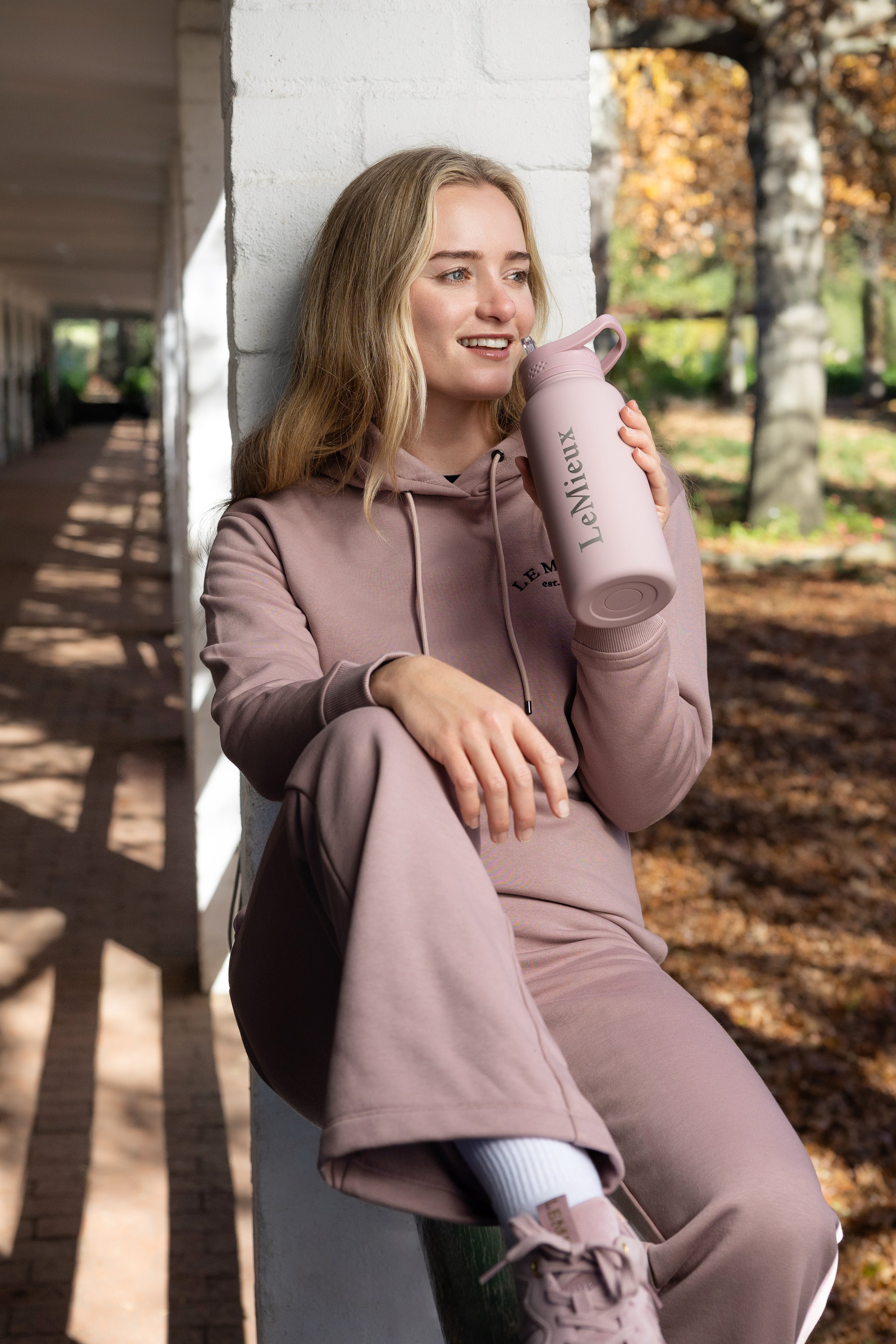 Front view of a model wearing Wild Rose LeMieux Luna Hoodie