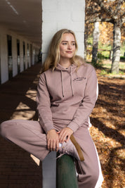 Front view of a model wearing Wild Rose LeMieux Luna Hoodie