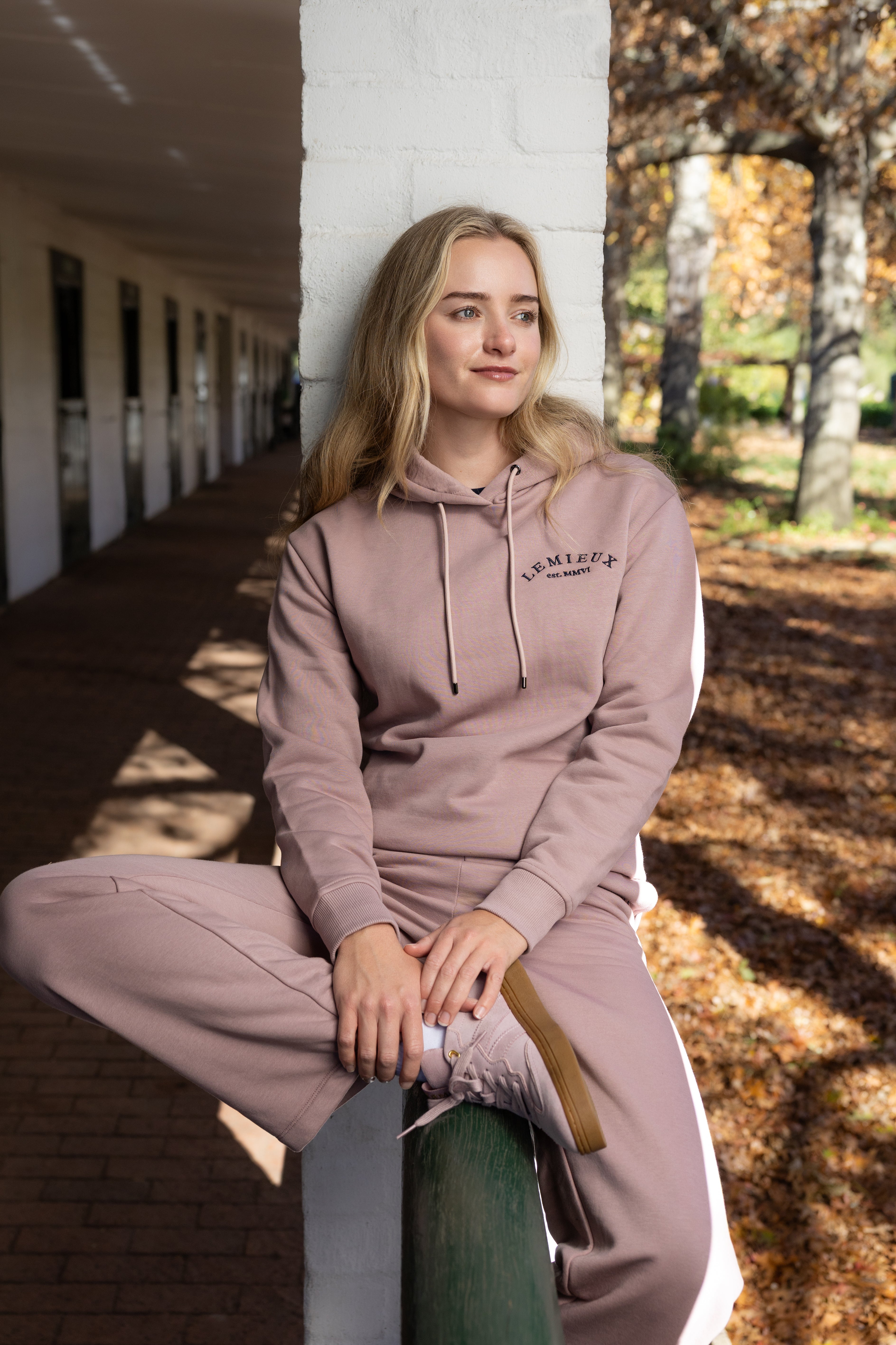 Front view of a model wearing Wild Rose LeMieux Luna Hoodie