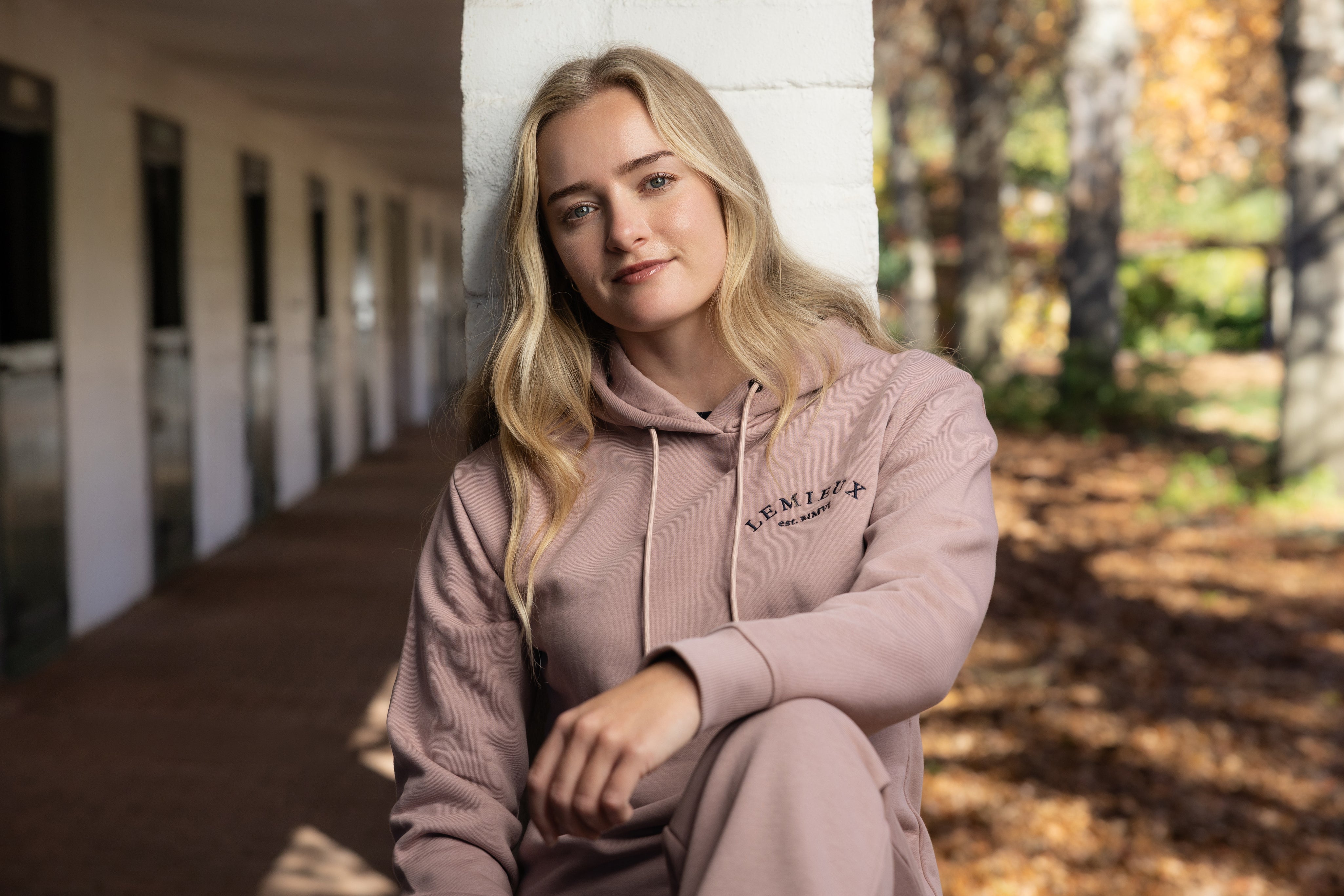 Front view of a model wearing Wild Rose LeMieux Luna Hoodie