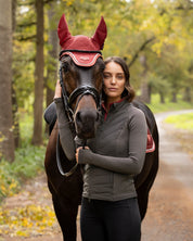 Angled front view of a model wearing Cocoa LeMieux Maddie Jacket