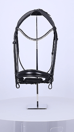 GIF of a Schockemohle Isabell Werth Bella Rose Dressage Bridle on a rotating platform