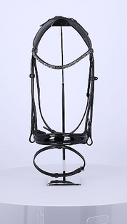 GIF of a Schockemohle Isabell Werth Satchmo Dressage Bridle on a rotating platform on a plain background