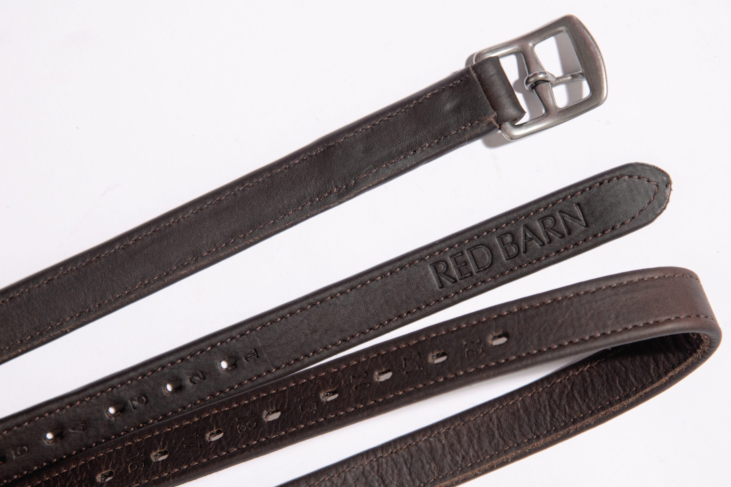 View of the brown Red Barn Geta' Grip Calf Lined Leathers on a plain background