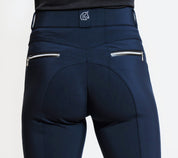 Close-up back view of a model wearing the navy KL Select Gabrielle Knee Patch Breech on a plain background