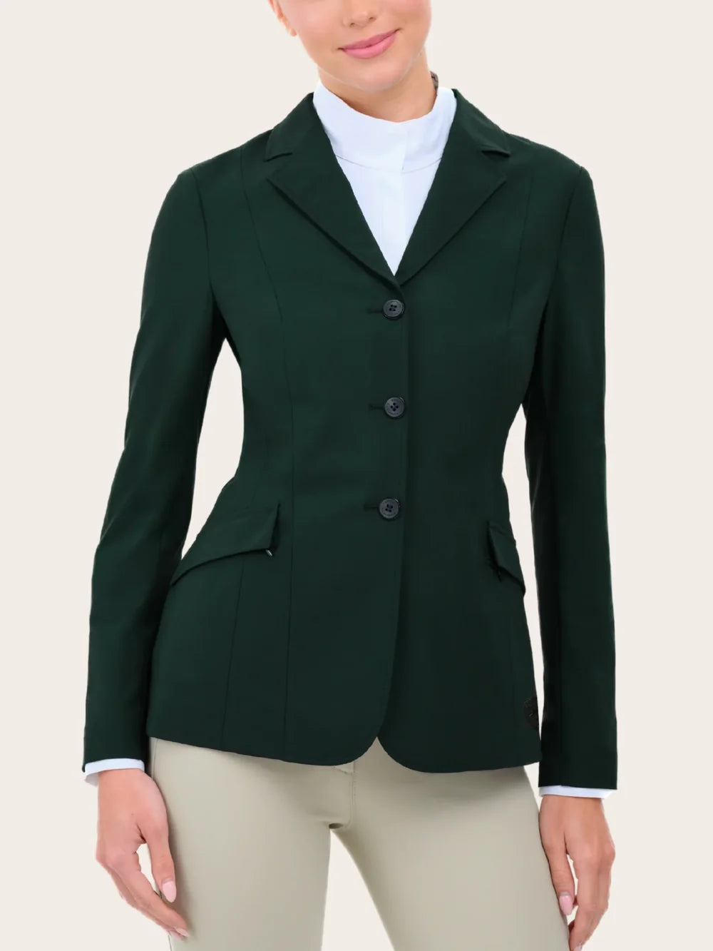 Close-up front view of a female model wearing the green RJ Classics Legacy Lite Show Coat on a plain background