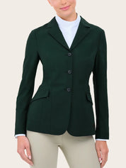Close-up front view of a female model wearing the green RJ Classics Legacy Lite Show Coat on a plain background