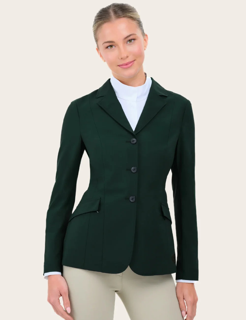 Front view of a female model wearing the green RJ Classics Legacy Lite Show Coat on a plain background