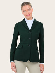 Front view of a female model wearing the green RJ Classics Legacy Lite Show Coat on a plain background