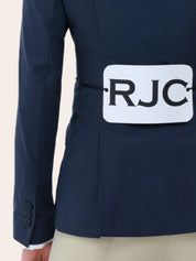 Close-up back view of a young female model wearing the navy RJ Classics Legacy Lite Jr Show Coat with RJC competition number tabard on a plain background
