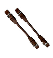Front view of a pair of brown Camelot Leather Bit Converters on a white background
