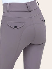 Back-detail view of the RJ Classics Margot Luxe-Tek Breech in Purple Haze showing the wide waistband with belt loops, contoured seat seams, and a flap back pocket with button closure.