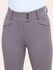 Close-up of the RJ Classics Margot Luxe-Tek Breech in Purple Haze, showing the high-rise waistband with double front buttons, belt loops, smooth stretch fabric, and front pockets with contrast trim and RJ Classics logo embroidery.