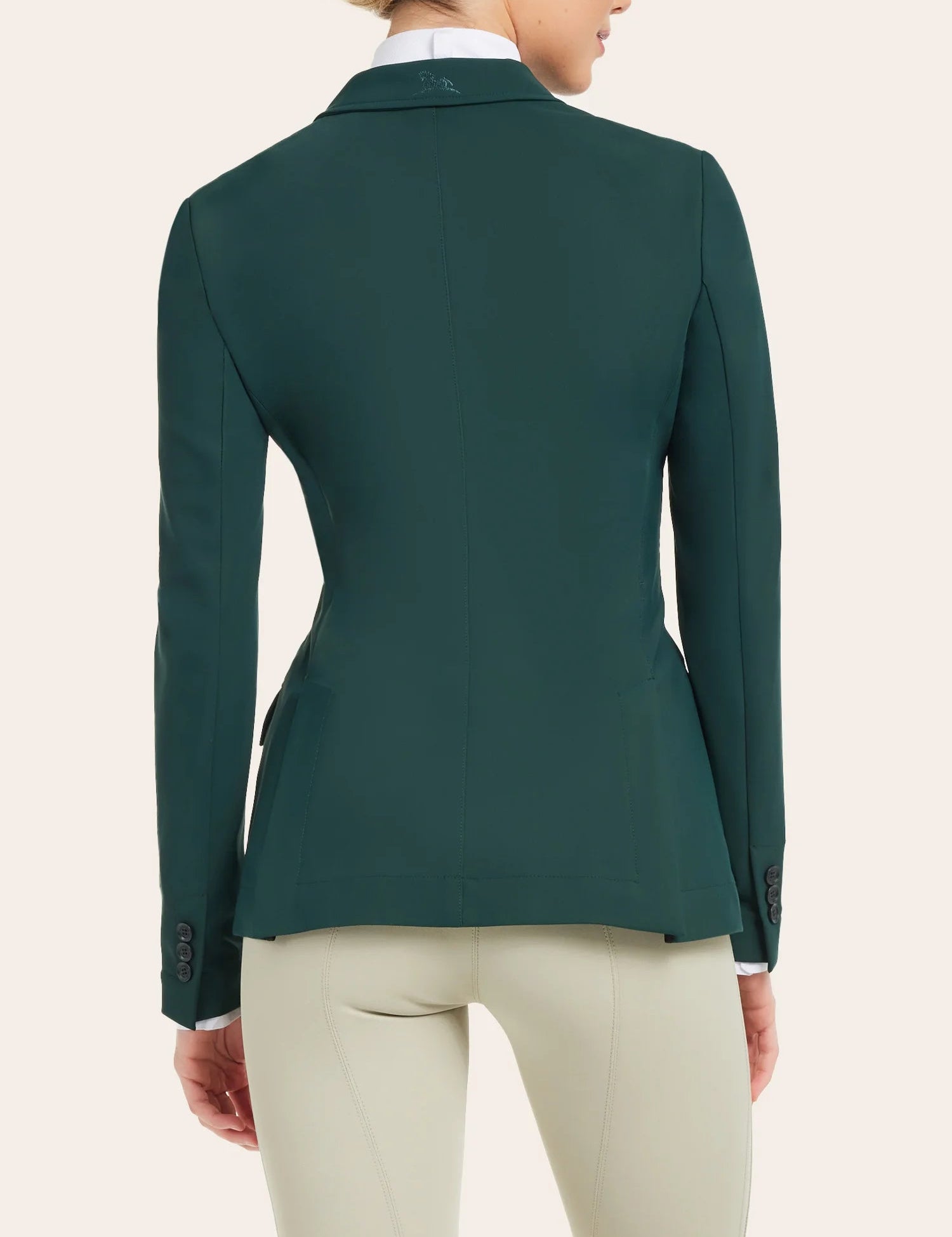 Back view of a model wearing the pine RJ Classics Monterey Show Coat on a plain background