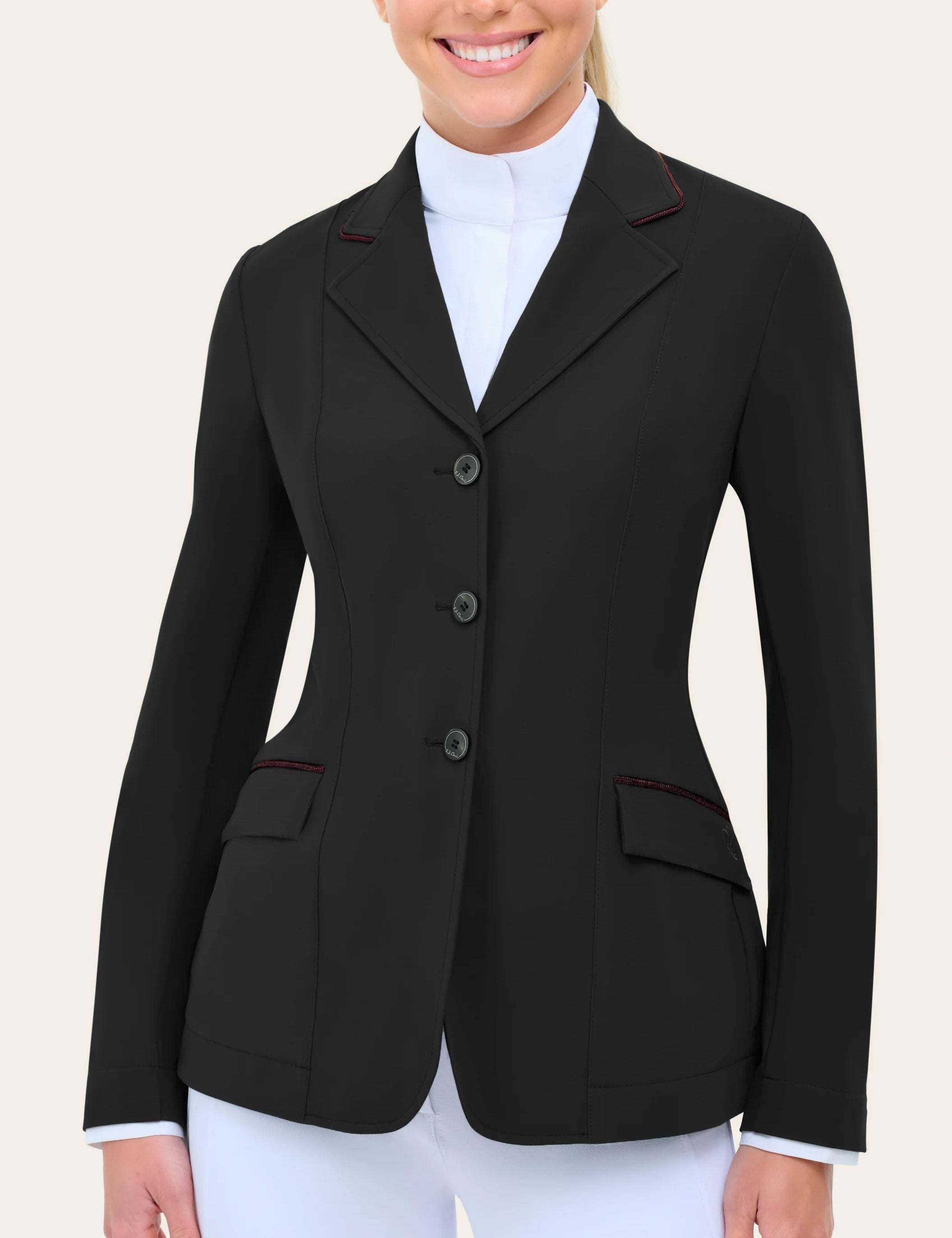 Front view of a model wearing the black with burgundy piping  RJ Classics Monterey Show Coat on a plain background