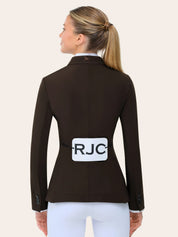 Back view of a female model wearing the chocolate RJ Classics Monterey Show Coat on a plain background