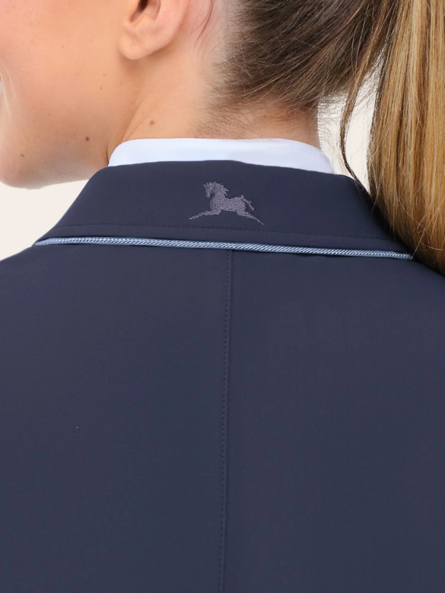 Close-up view of the collar on the twilight ice grey piping RJ Classics Monterey Show Coat on a plain background