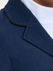 Close-up front view of the lapel on the twilight weave RJ Classics Monterey Show Coat on a plain background