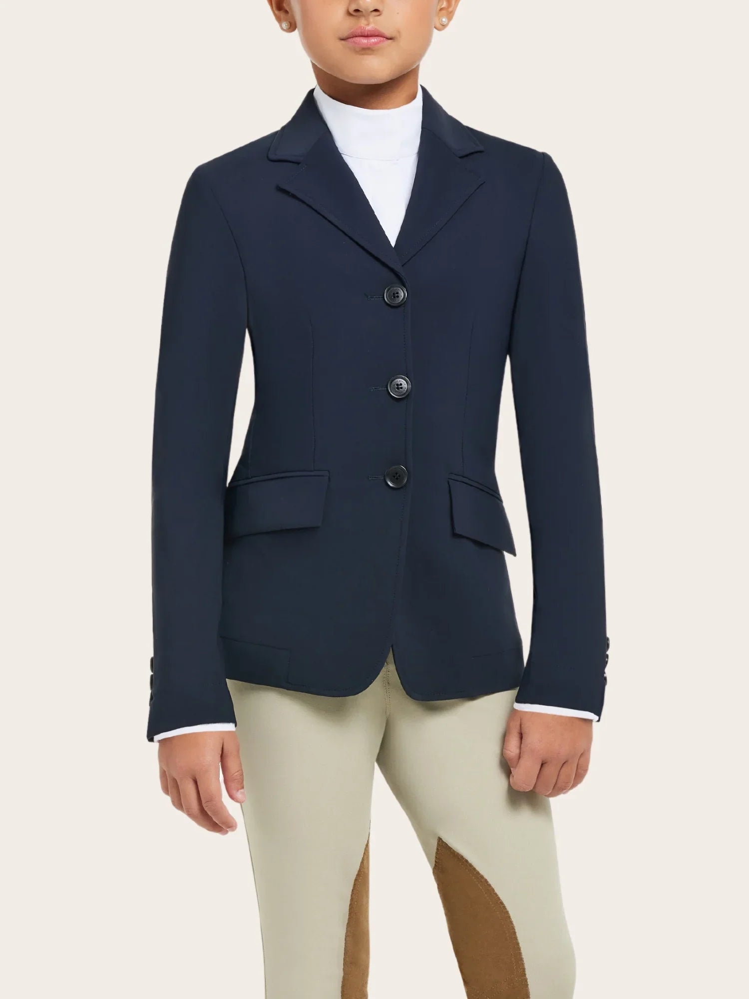 Front view of a young female model wearing the navy RJ Classics Kids Shore Show Coat on a plain background