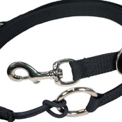 Close-up view of the black Nunn Finner Rapid Release Cross Tie on a white background