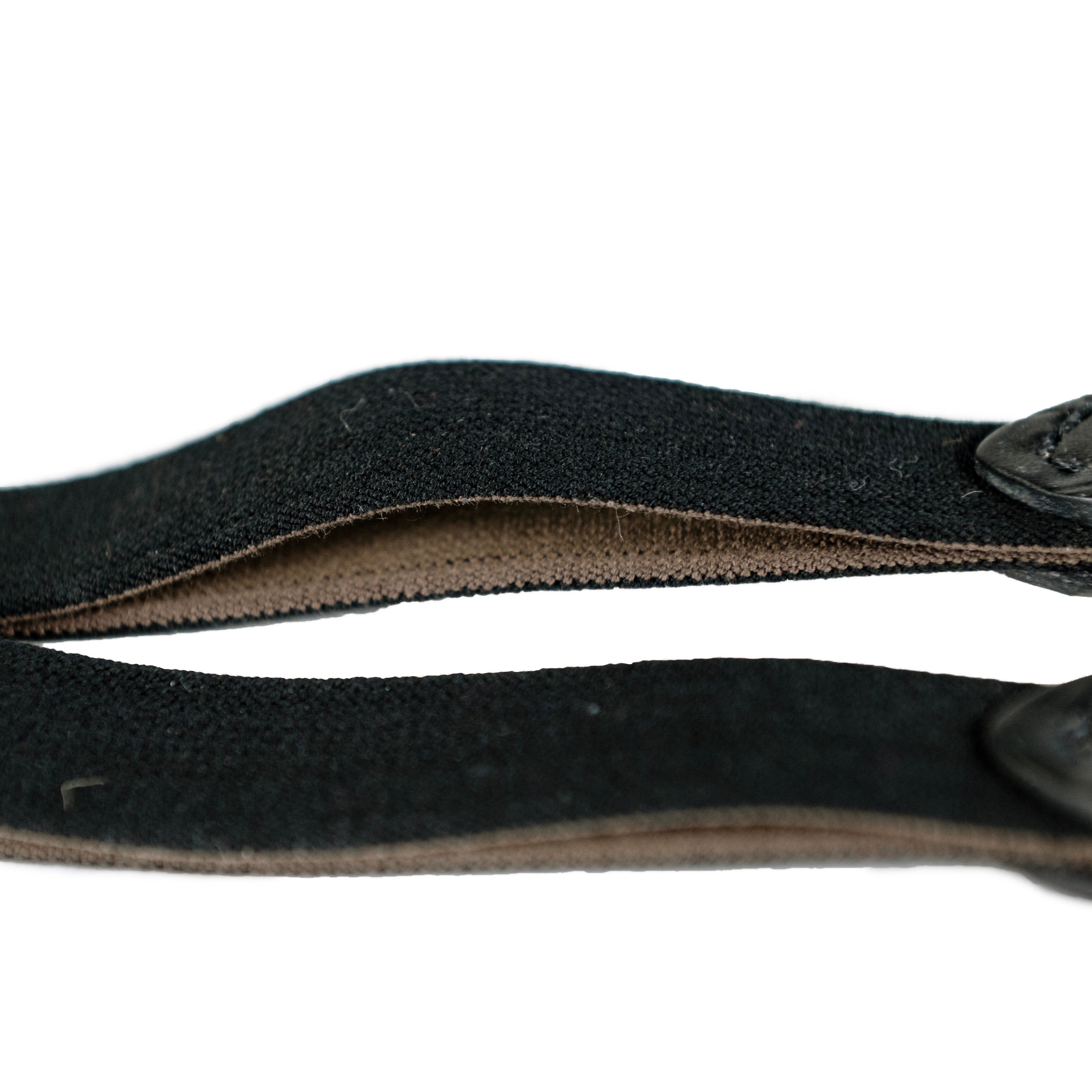 Close-up view of the havana Nunn Finer Elastic Running Martingale Attachment on a plain background