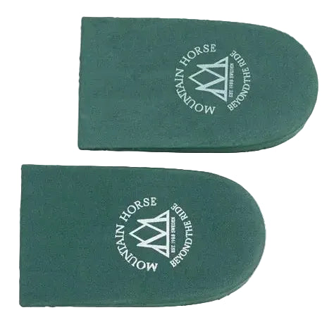 Full view of a pair of green Mountain Horse Heel Lifters on a white background