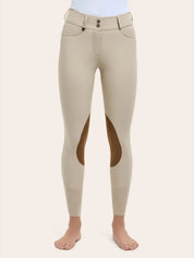 Front view of the RJ Classics Olivia Luxe-Tek Breech in Sand, featuring a mid-rise waistband with double-button closure, belt loops, smooth stretch fabric, front pockets, and brown suede knee patches with perforated lower-leg panels, shown on a model against a plain light background.
