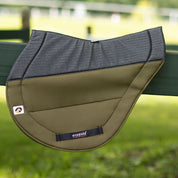 Side view of the olive green Ecogold Secure Cross Country Pad on a green fence board