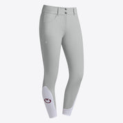 Front angled view of Cavalleria Toscana Knee Grip Jumping Breeches in gray showing contrasting ankle detail and logo