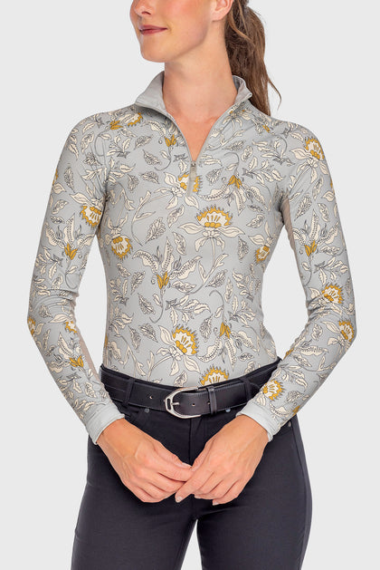 Front view of a female model wearing the Dove Vintage Jacobean Kastel 1/4 Zip Long Sleeve Sun Shirt on a plain background