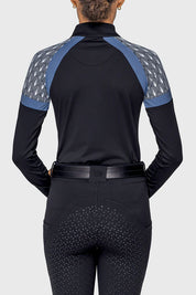Back view of a female model wearing the Black/Pacific Blue Deco Fans Kastel 1/4 Zip Long Sleeve Sun Shirt on a plain background