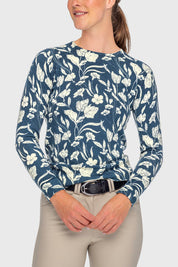 Front view of a female model wearing the Sailor Blue French Tulip Kastel Crewneck Sweater on a plain background