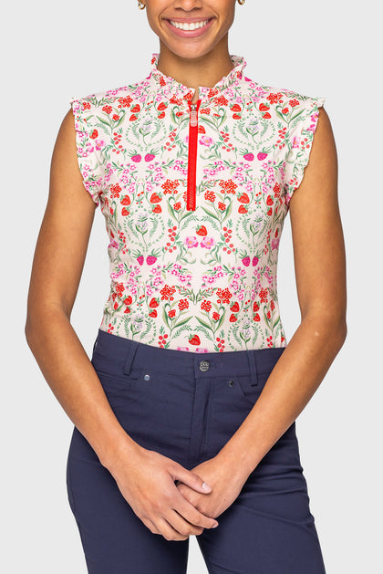 Front view of a model wearing the Red Scandinavian Berries Kastel 1/4 Zip Ruffle Tank on a plain background