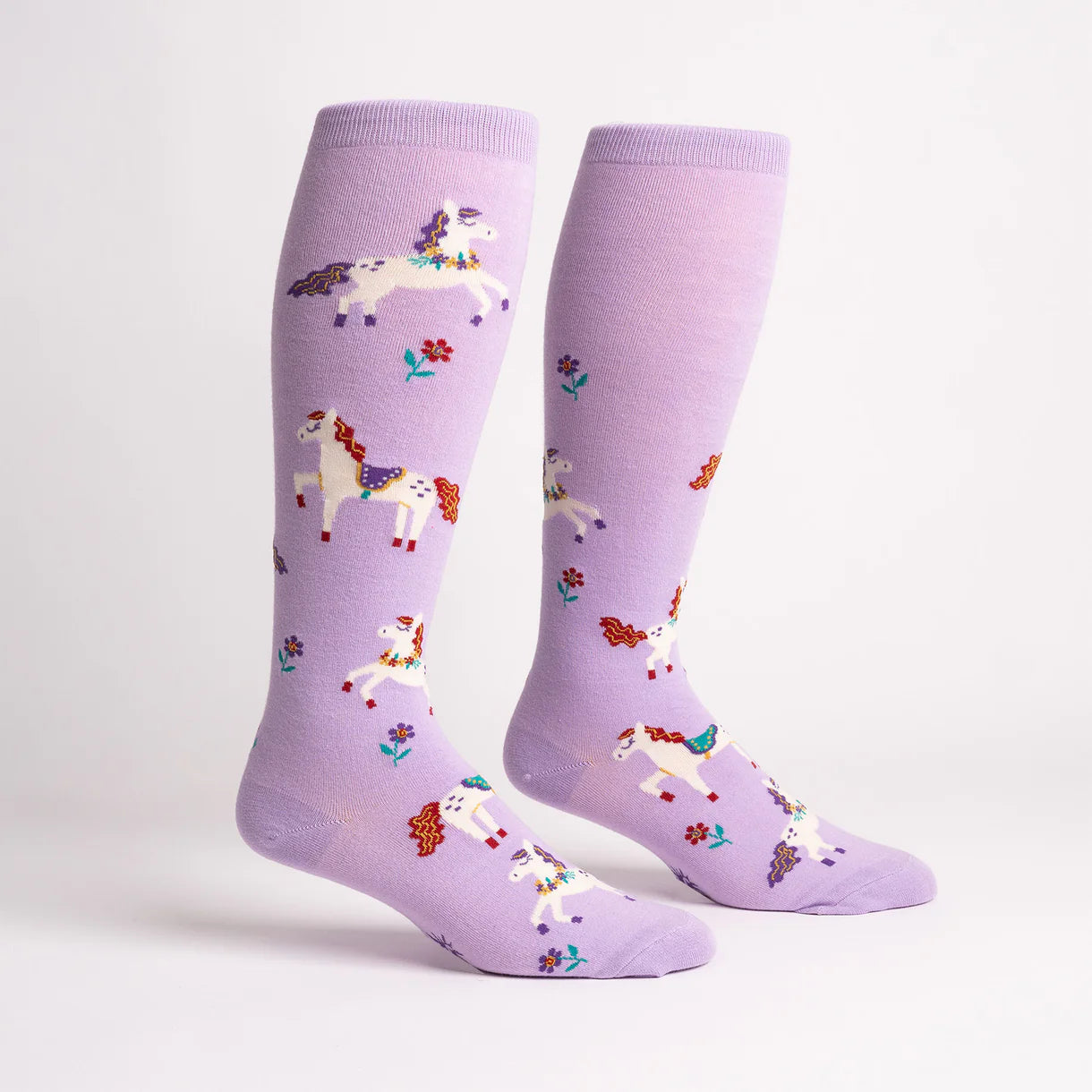 Side views of the Prancing Around Sock It To Me Knee High Socks on a plain background