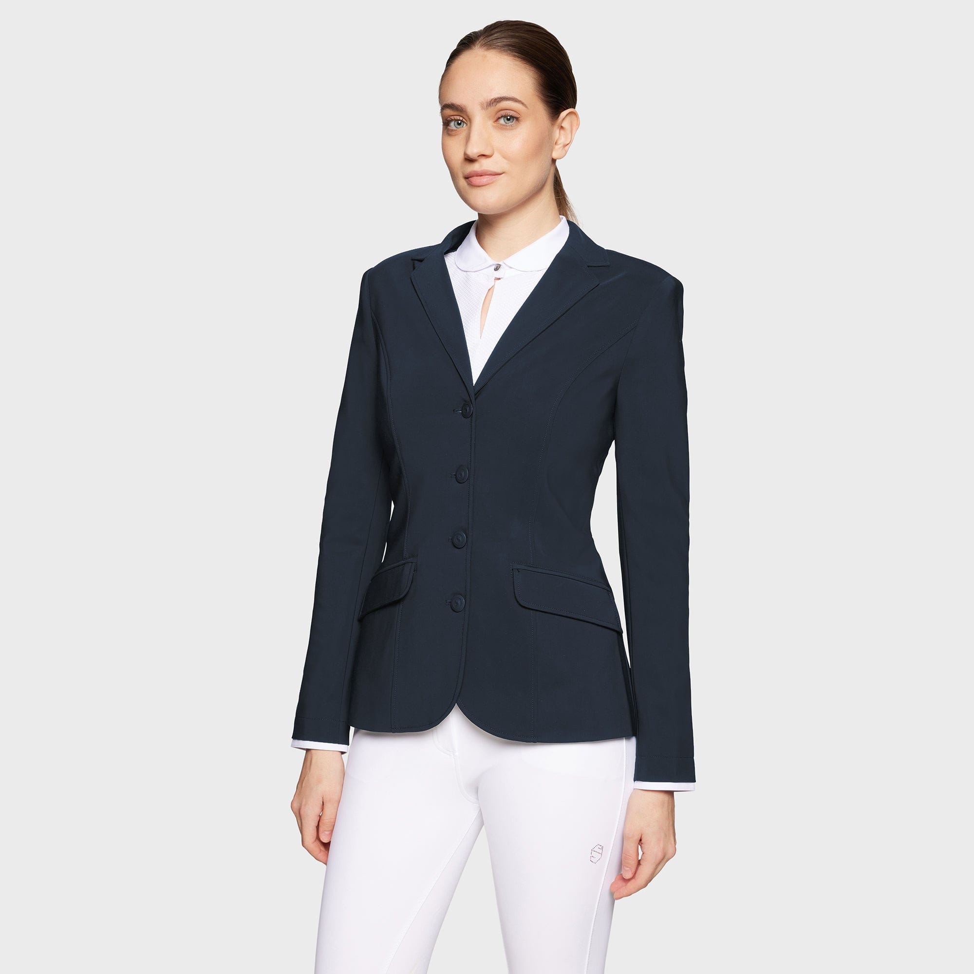 Front view of a female model wearing the Navy Samshield Alexia Show Coat on a plain background