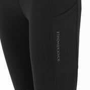 Close-up side view of the Dark Grey Schockemohle Air Sporty Full Seat Riding Tights on a white background