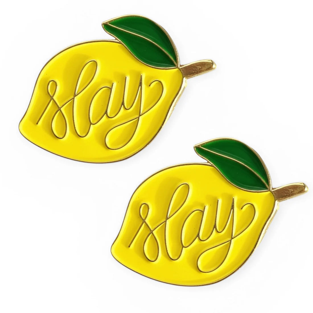 Front view of a pair of Slay Lemon Dubois Cheval Number Pin Charm on a white background