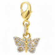 Front view of the gold butterfly Dubois Cheval Braid Charm on a white background