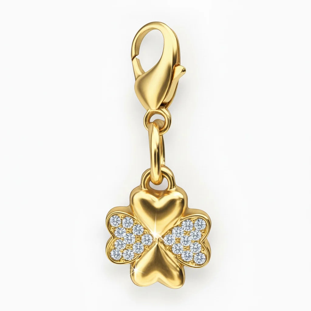 Front view of the gold clover Dubois Cheval Braid Charm on a white background